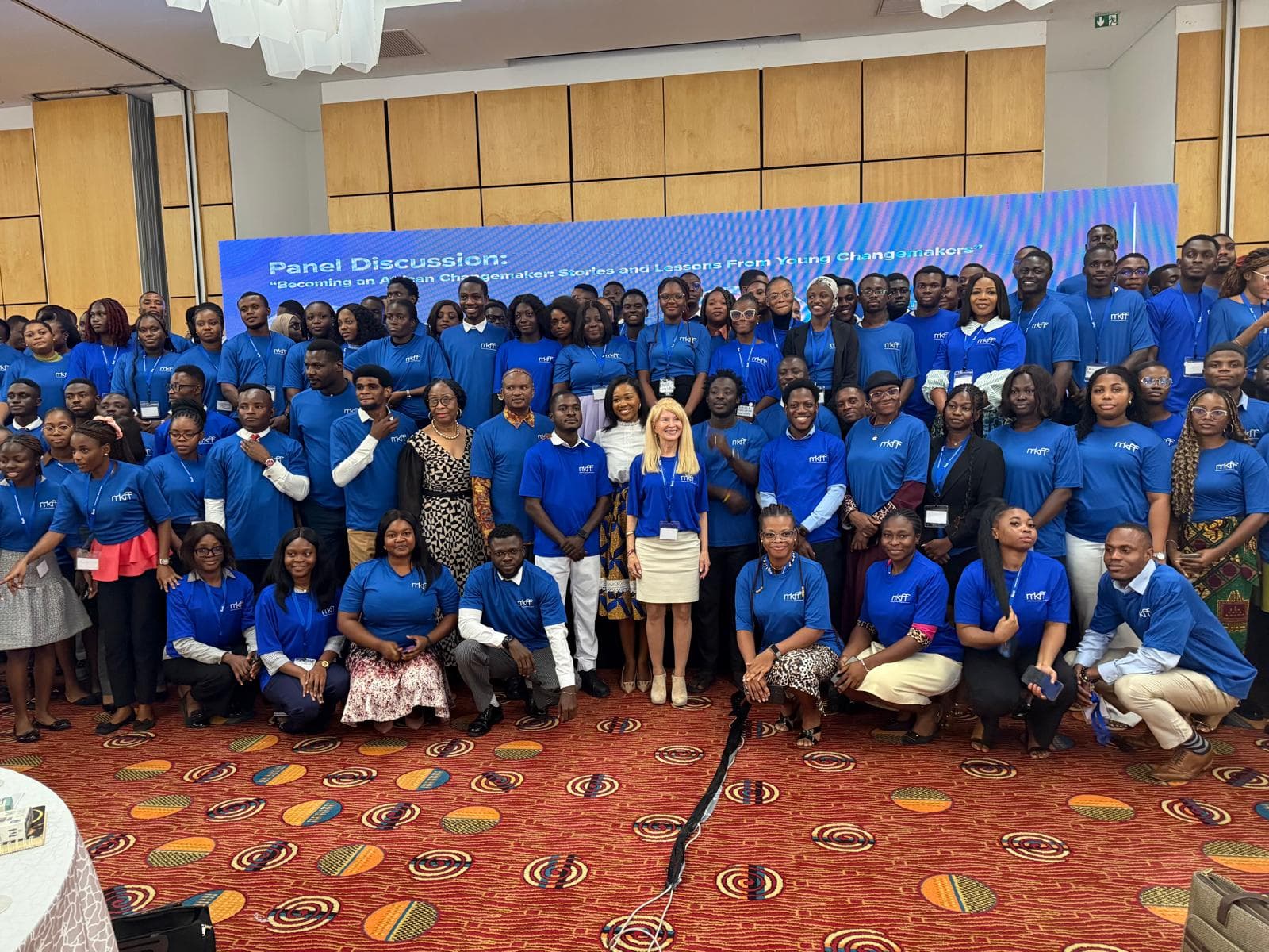 Kectil youth leaders in a large-group panel discussion — Global Youth Index research community.